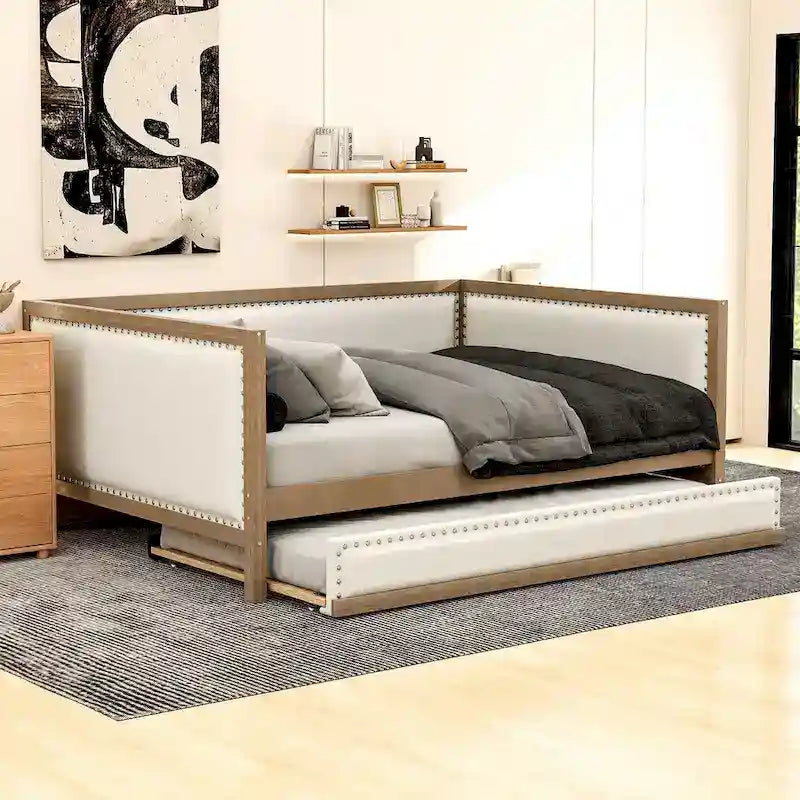 Lit de repos double en bois rembourré avec lit gigogne et décor de clous