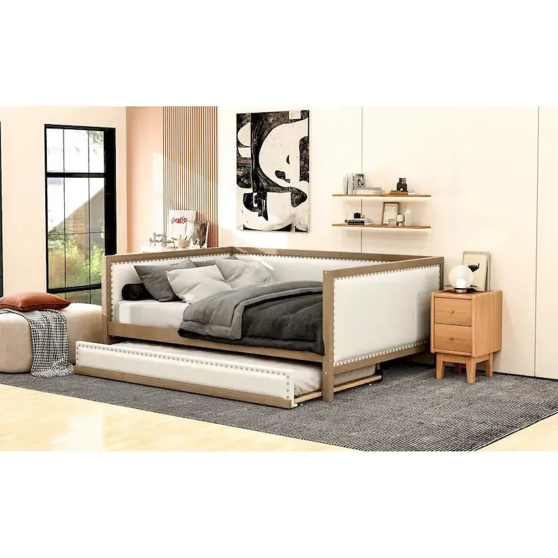 Lit de repos double en bois rembourré avec lit gigogne et décor de clous